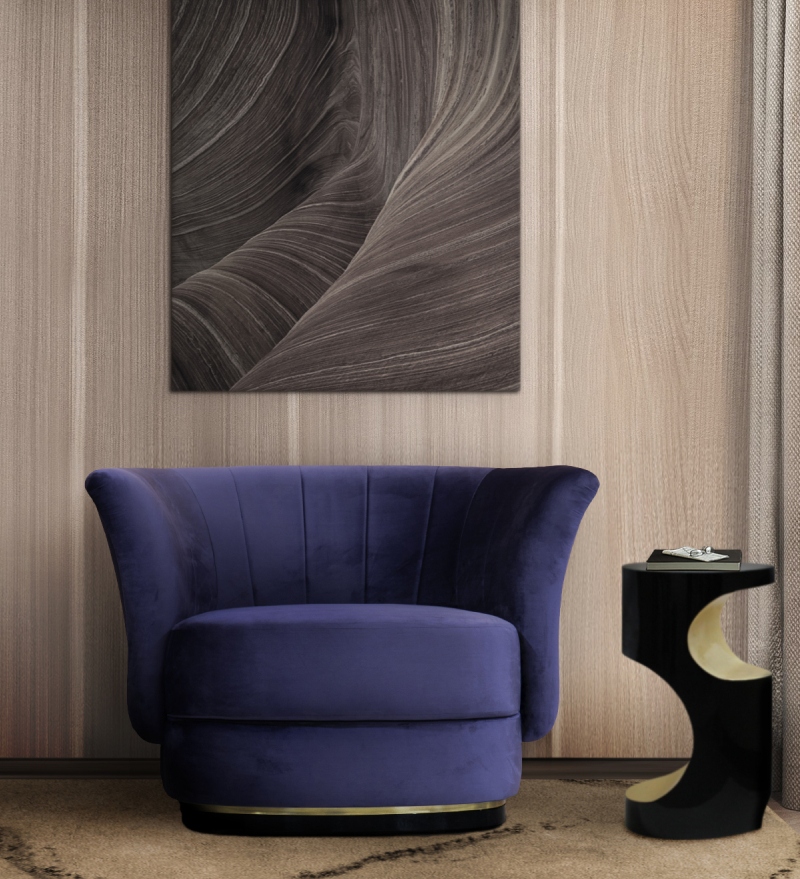 Harrison Fae Design - Upholstered furniture. This modern reading corner has the velvet upholstered ELK Armchair next to the BRYCE Side Table creating a unique and modern space.
