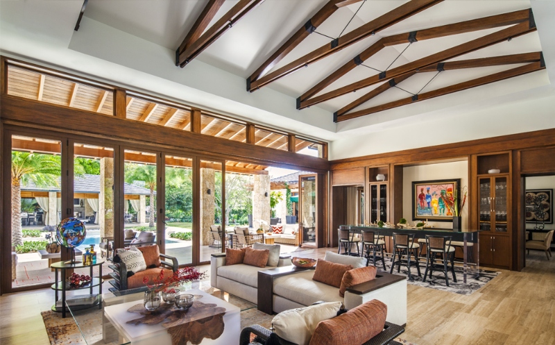 A tropical oasis with outdoor terraces that are as practical as the interior areas creates a modern yet relaxing atmosphere that is ideal for its Miami location.